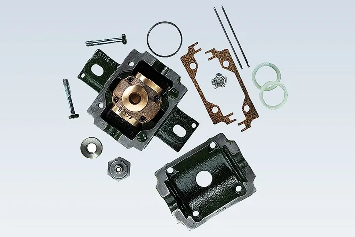 Fan bearing housing with ring oiler lubrication system for continuous operation